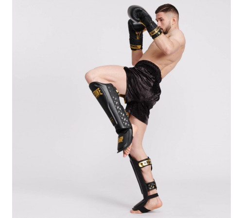 Захист гомілки Leone DNA Rex Leather L, чорно-золостисті