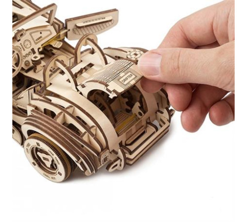 Дерев'яний механічний 3D конструктор Ugears Гоночний автомобіль ДріфтКобра (70161) Дерев'яний механічний 3D конструктор Ugears Гоночний автомобіль ДріфтКобра (70161)