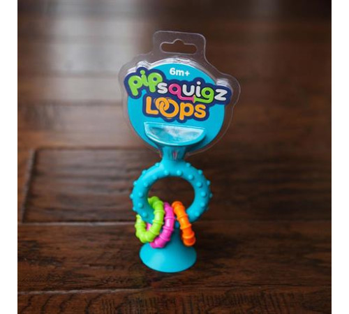 Прорізувач-брязкальце на присосках Fat Brain Toys pipSquigz Loops бірюзовий (FA166-1) Прорізувач-брязкальце на присосках Fat Brain Toys pipSquigz Loops бірюзовий (FA166-1)