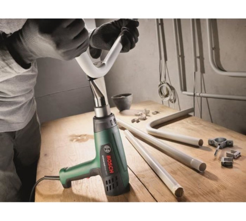 Фен будівельний Bosch Universal Heat 600 з 2 додатковими насадками Фен будівельний Bosch Universal Heat 600 з 2 додатковими насадками